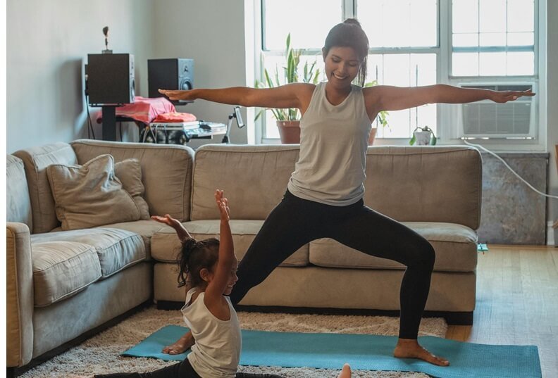 Female doing warrior yoga pose