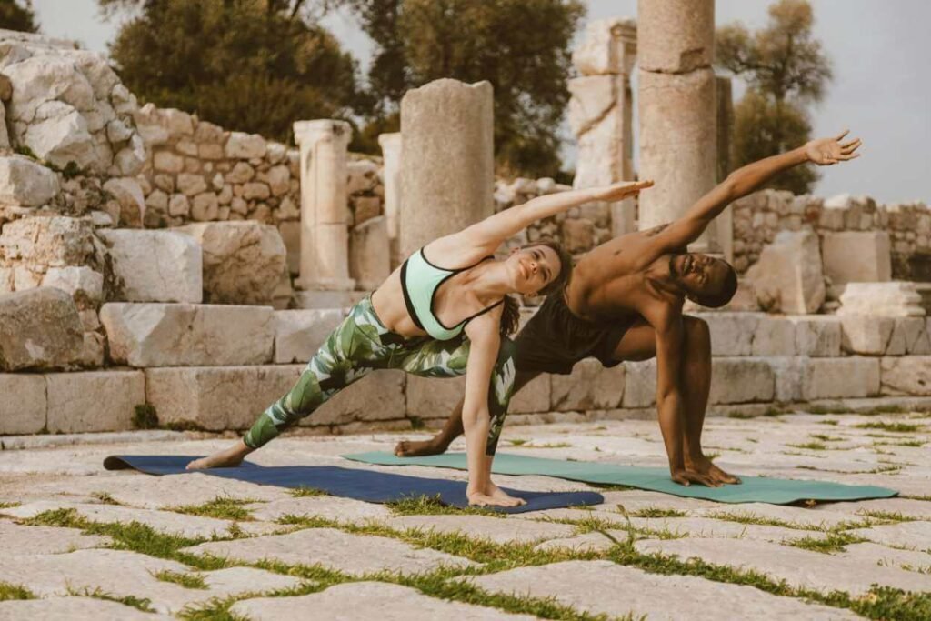 girl doing yoga stretching arms