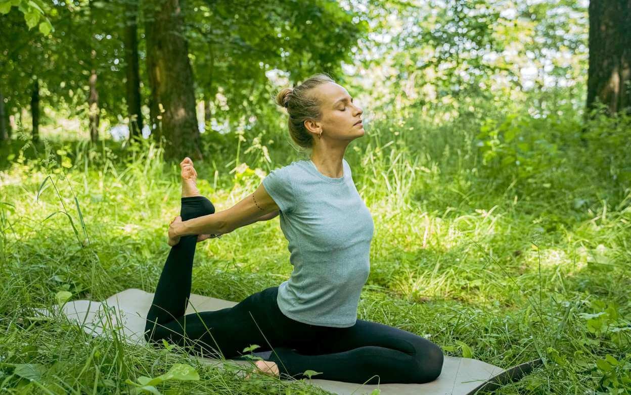 girl doing yoga to stretch upper body